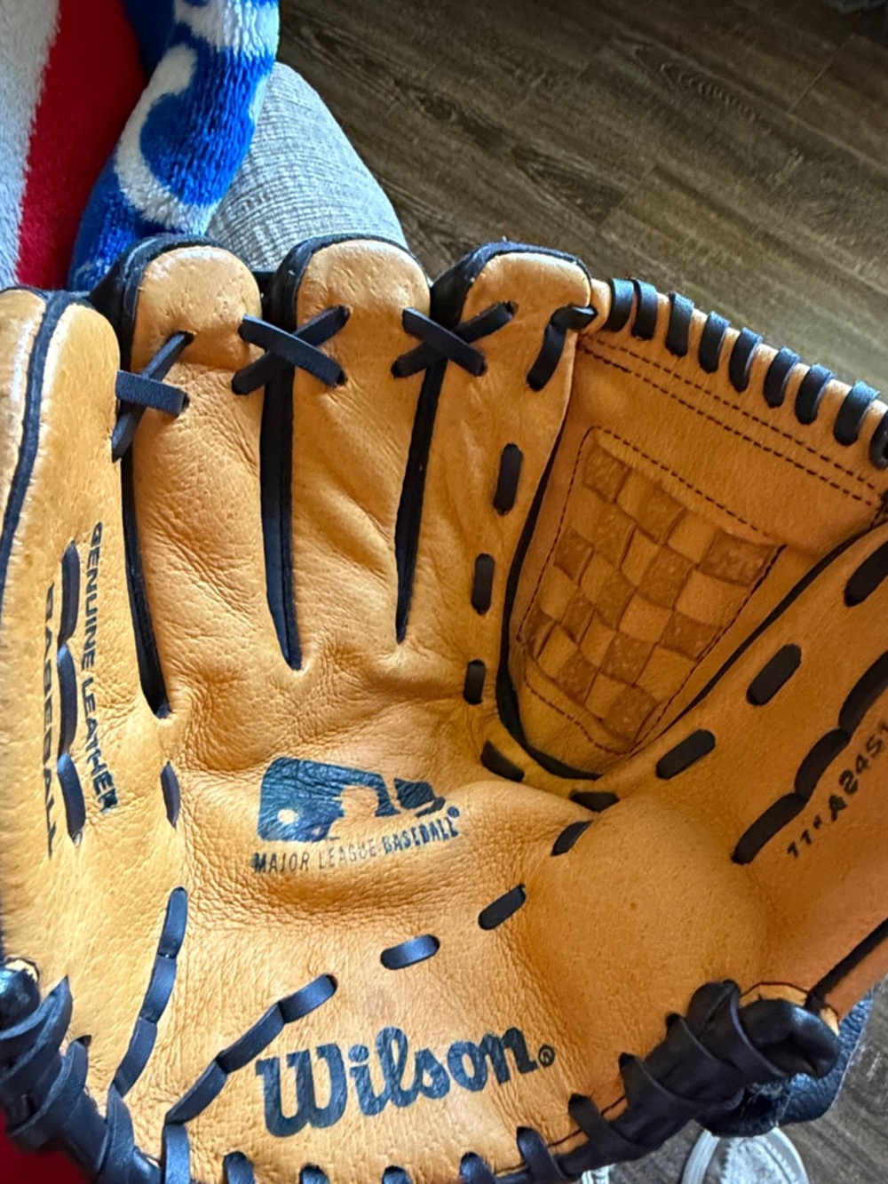 Wilson Tan and Black Leather Baseball Glove.
For Left-hand size 11